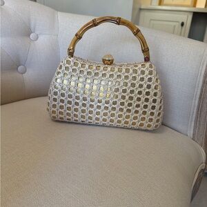 Elegant Cream Woven Handbag with Bamboo Handle